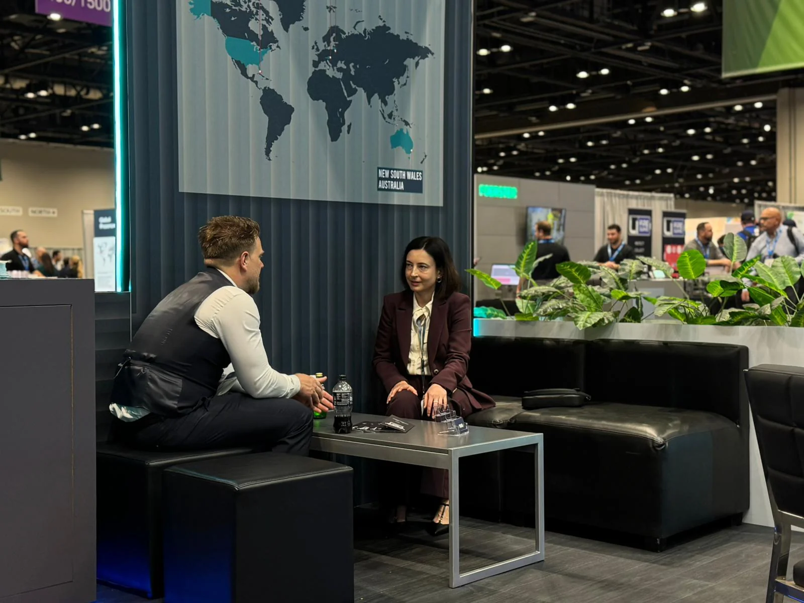 Business conversation at an aviation industry exhibition.